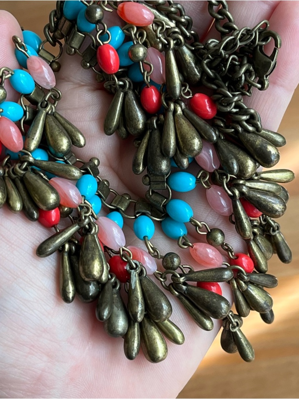 Antique-style brass beaded statement necklace with boho-style dangling charms - Picture 8 of 8